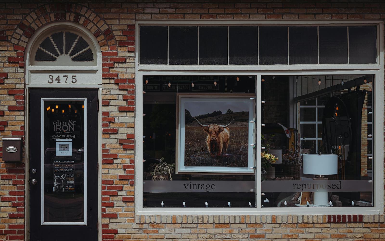 Small business storefront with vintage and repurposed signage