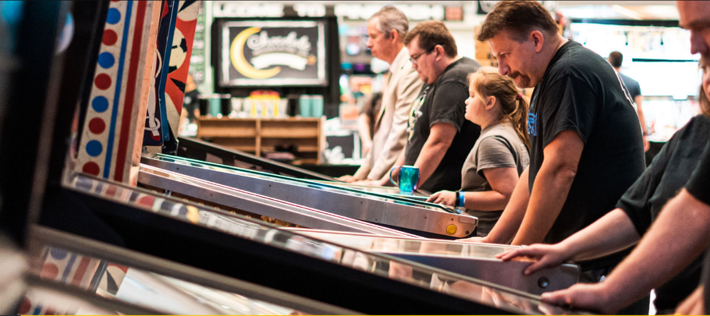 Players at pinball machines during the ReplayFX gaming and pinball convention in Pittsburgh